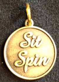 Bronze Colored: Sit Spin